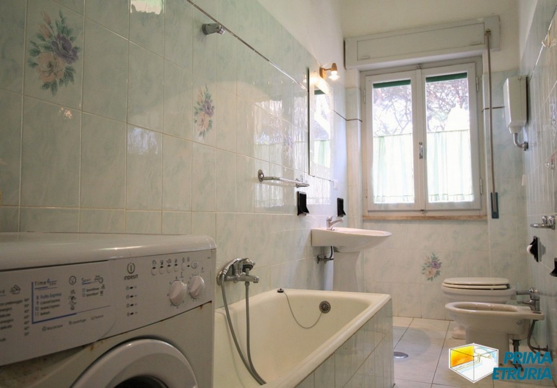 TRILOCALE CON GARAGE E GIARDINO - ZONA ROSMARINA -